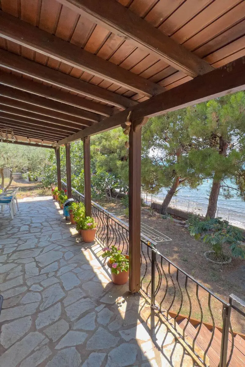 pine beach house outdoor hallway